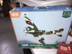 A Parkzone spitfire MKIX with remote control