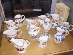 A collection of 12 Royal Worcester miniature jugs of Historic jugs in collaboration with The Dyson