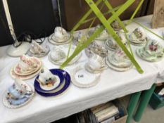 A quantity of porcelain cups and saucers trios