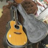 An Applause (Ovation) model AE28 electro-acoustic guitar with luxury hard case.