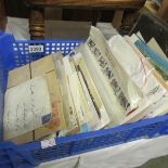 A crate of first day covers, air mail, 1930's onwards and Post office cards etc.