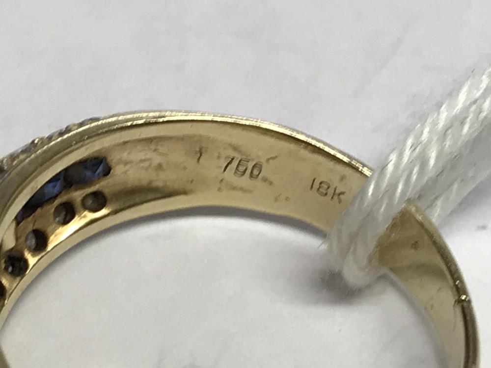 An 18ct gold ring set sapphires and diamonds, marked 750 18k, approximately 6 grams, size P. - Image 2 of 2