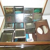 A wooden case containing magic lantern slides.