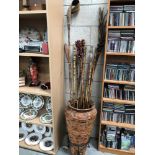 A bamboo planter and a quantity of bamboo