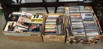 A large quantity of CD's (3 boxes)