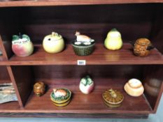 2 shelves of novelty butter and preserve pots