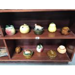 2 shelves of novelty butter and preserve pots