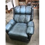 A blue leather reclining chair