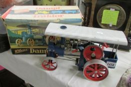 A boxed Wilesco traction engine.