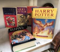 2 first edition Harry Potter books and 3 paperbacks