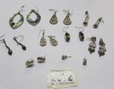 7 pairs of assorted earrings including some silver.