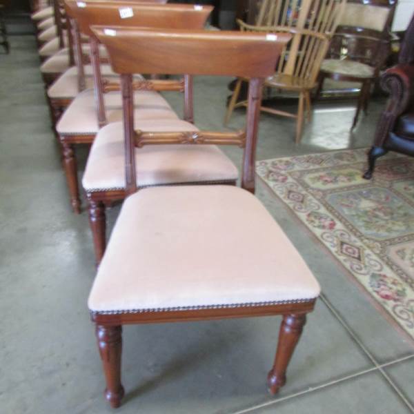 A set of 10 mahogany dining chairs comprising 2 carvers and 10 dining.