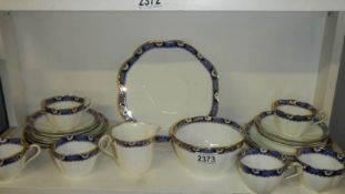 A 15 piece blue and white tea set.