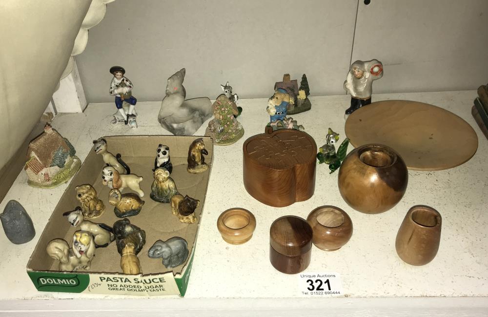 A quantity of Wade animals, small Liliput lane cottages, a wooden art puzzle etc.