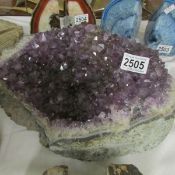 A large amethyst crystal.