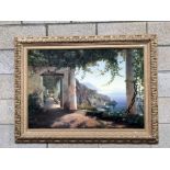 A framed print in ornate frame "View of the Amalfi coast" by C. F. Aagaard.