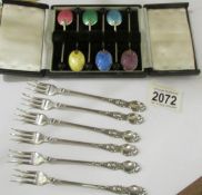 A cased set of 6 silver and enamel coffee spoons (hall marked Birmingham, 1959,