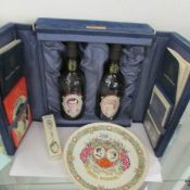 A cased limited edition Charles and Diana royal Wedding wine set and a Royal Wedding plate.