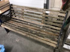 A garden bench with cast iron ends