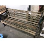 A garden bench with cast iron ends