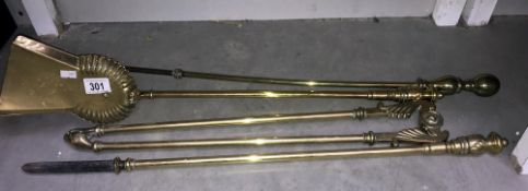 A quantity of Victorian brass fire tools