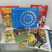 An unofficial world cup book, a top team collection, a 1970 world cup coin collection,