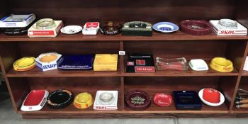 5 shelves of pub brewery advertising ashtrays