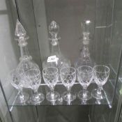3 cut glass decanters and 6 glasses.