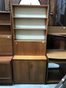 A wall unit book case and cabinet