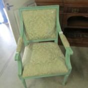 A painted arm chair.