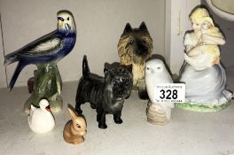 A quantity of animal figures including Beswick Cairn Terrier, Sylvac Cairn Terrier, Holland budgie,