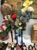 6 tall coloured glass spill vases with artificial flowers