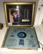 2 Elvis Presley 78's records plus an Elvis picture with original filmcell limited edition