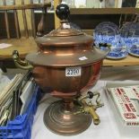 A copper samovar urn.