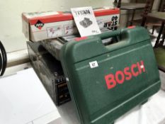 A cased Bosch set of 2 drills,