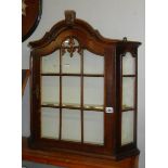 A wall mounting display cabinet.