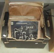 A quantity of 78 rpm records including Louis Armstrong, Dickie Valentine, Dixieland Jazz,