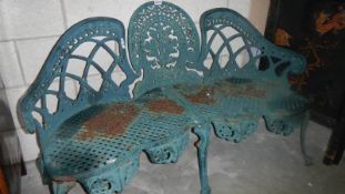 A cast iron garden seat.