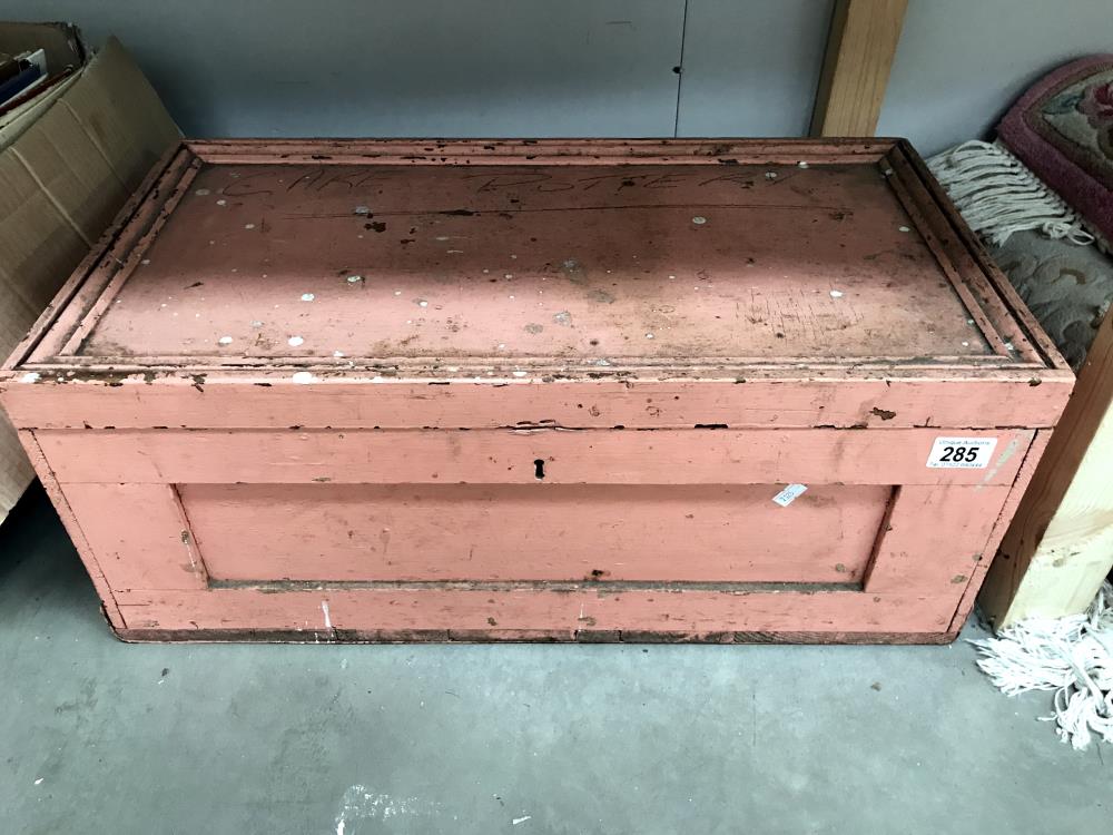 A painted wooden tool box