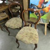 A pair of Victorian mahogany cabriole leg chairs.