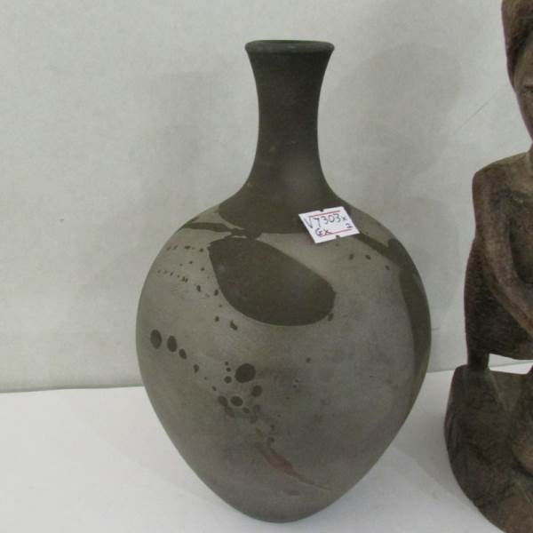 A wooden native figure and a pottery vase with depictions of leaves, marked SR. - Image 2 of 3