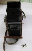 A Rollie Werke Franke & Heidecke, T2316547 Rolleiflex camera with case.