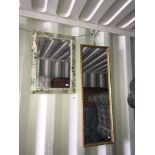 A bevel edged mirror and a long gilt framed mirror