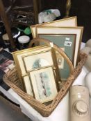 A vintage basket of prints,