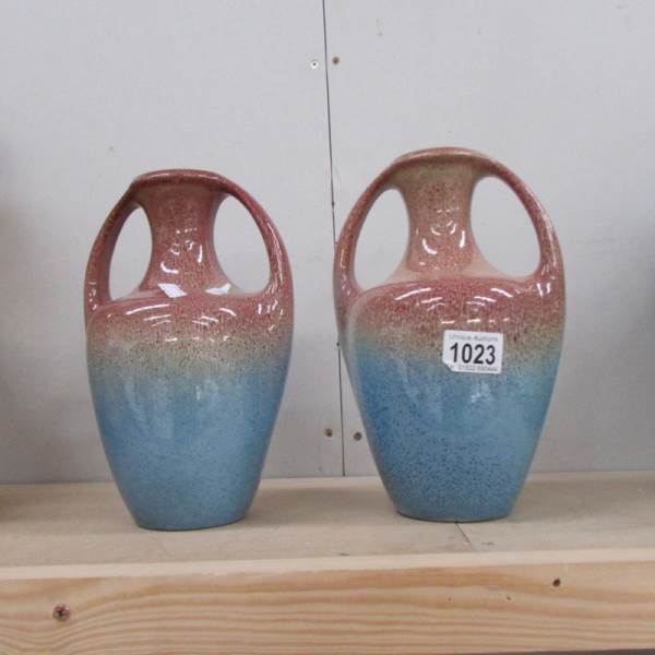 A pair of Bretby 2 handled vases.