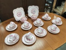 A pink floral tuscan tea set