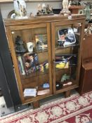 A 1930's oak display cabinet