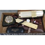 A leather wallet, 4 watches, slide rules, pair of glasses etc.