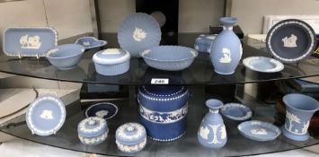 2 shelves of blue and white Wedgwood jasperware