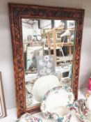A bamboo framed mirror